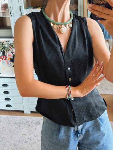 Jade Charm Necklace with Shells, worn on the neck